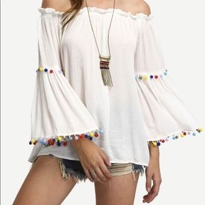 White Off the Shoulder Blouse with Pom Poms